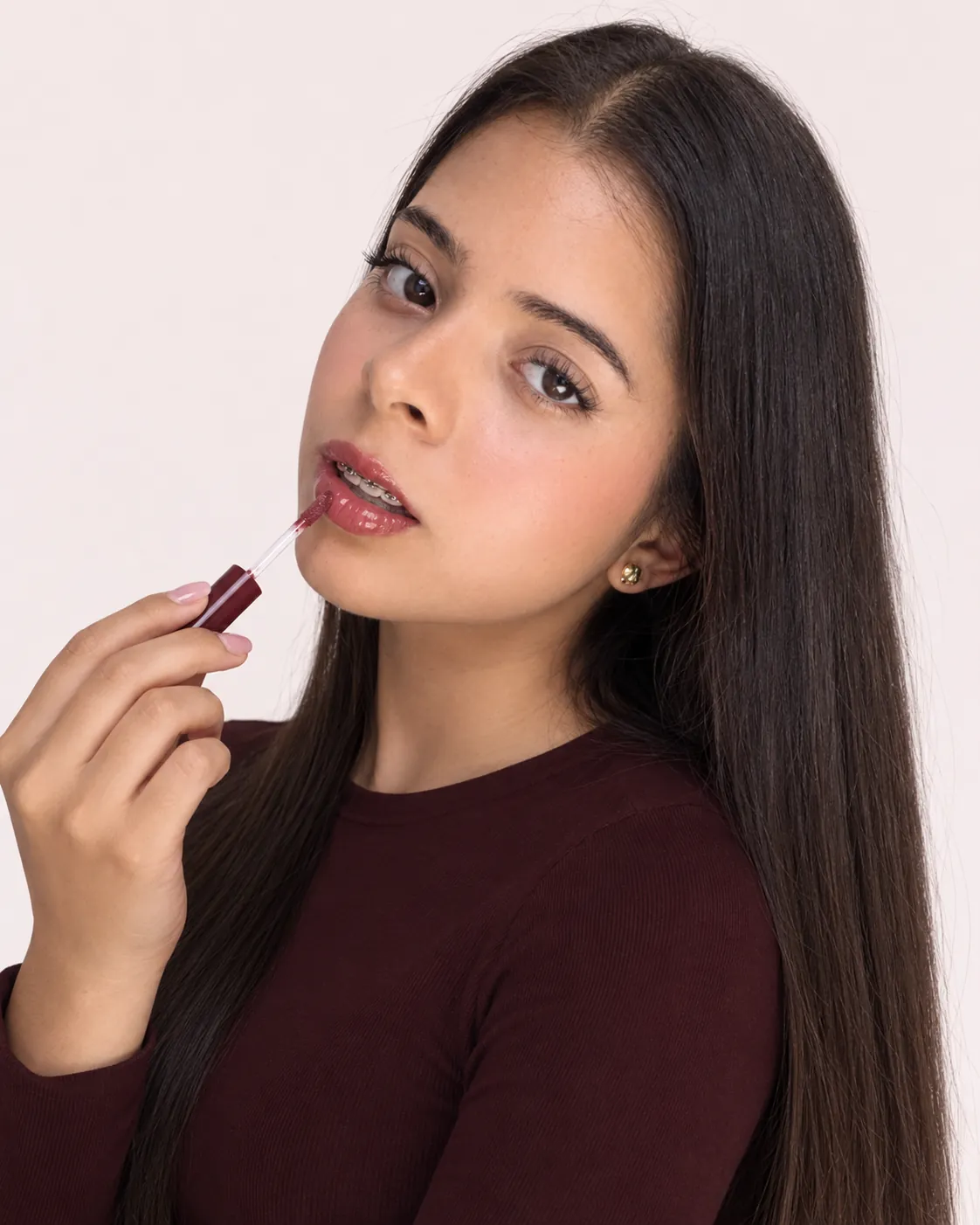 Aplicación de labial líquido y gloss Bella Forever